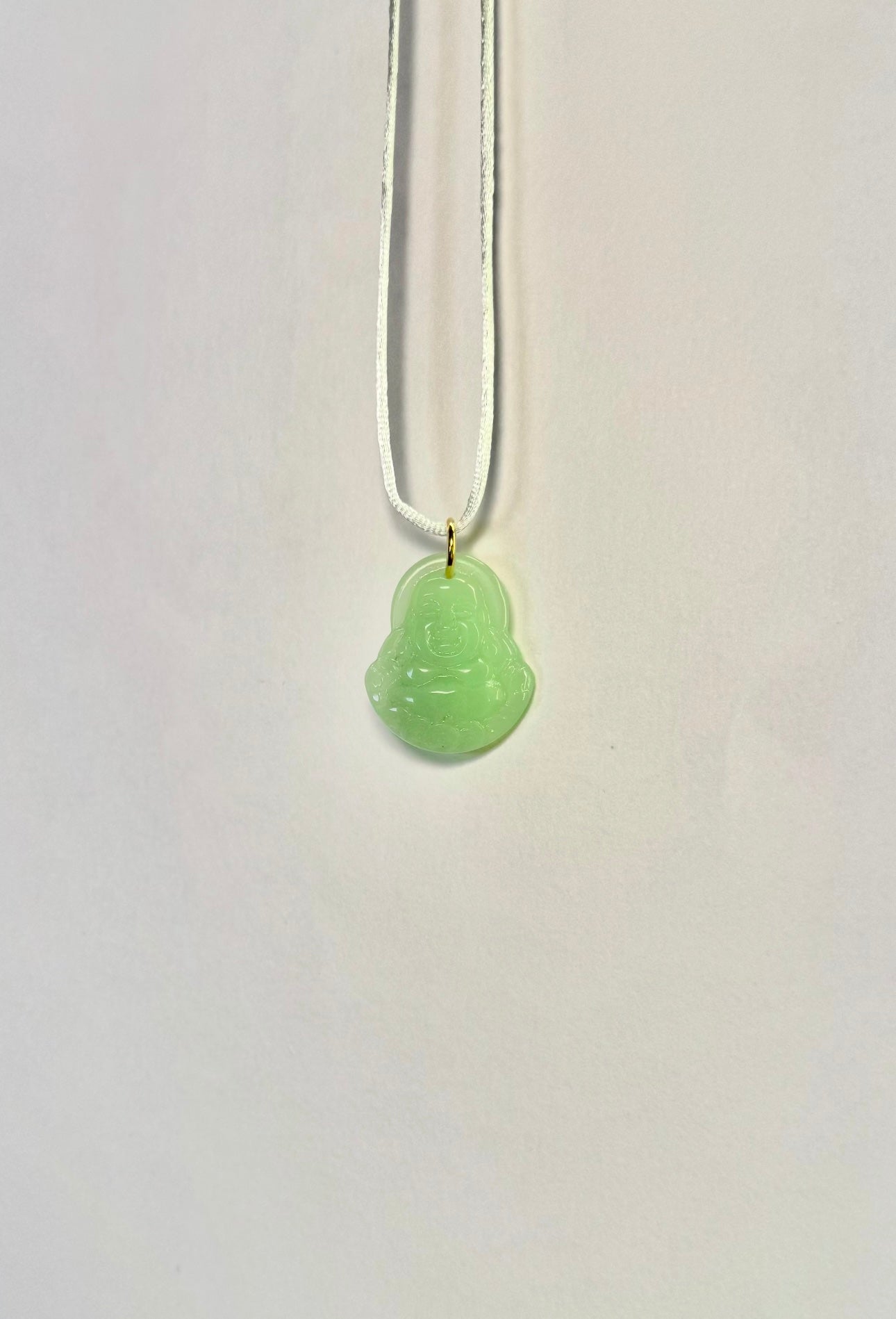 Charm Buddha di Giada